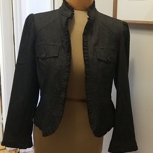 Cropped black denim jacket with ruffle detail